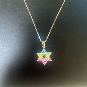 Beautiful, brand new, never worn multicolored stone Jewish star necklace.